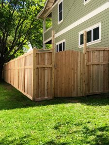 Grand Island fence company residential fencing contractors Nebraska wood fencing cedar western red cedar treated pine white red yellow CCA  ACQ2 incense fir 2x4 1x6 2" x 4"  1" x 6"  nails stain solid privacy picket scalloped board on board shadow box pickets rails posts installation panels post caps modern horizontal backyard front yard ranch gate garden diy split rail house lattice old rustic vertical metal post picket dog ear contemporary custom