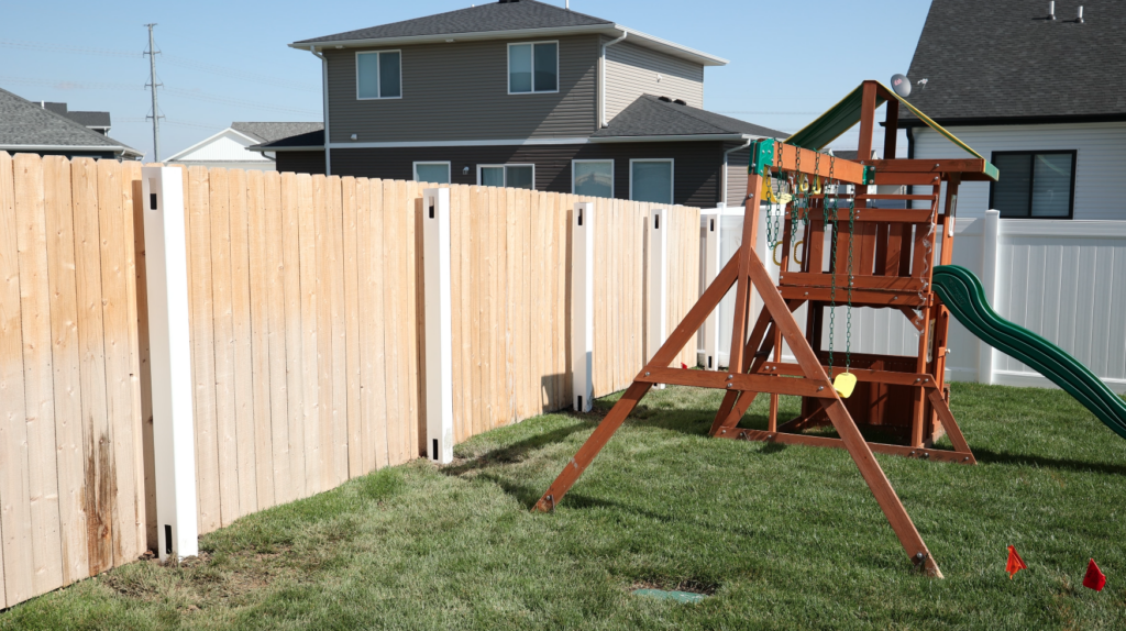 page-width photograph of a wood fence in Fargo, North Dakota